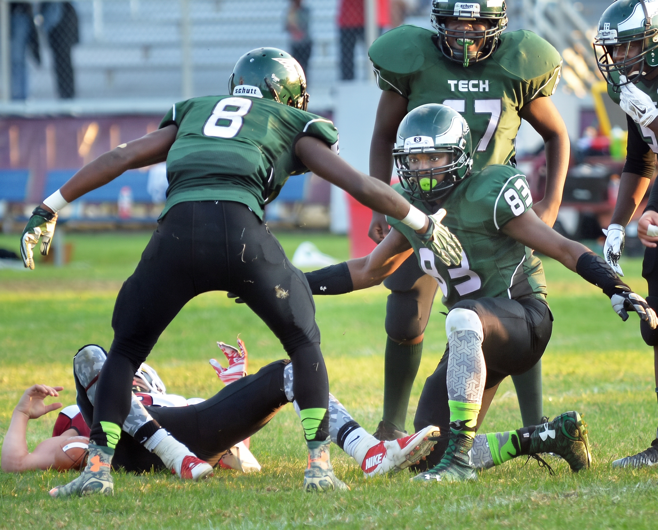 Green Tech Charter School Eagles football team in action on the field during a game in Albany, NY