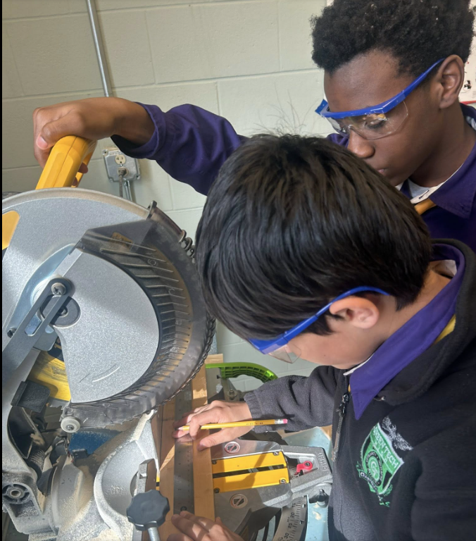 Green Tech Charter School construction pathway students working with tools in Albany, NY